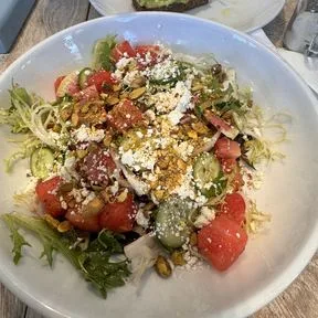 Watermelon salad and avocado toast at a cafe in New York